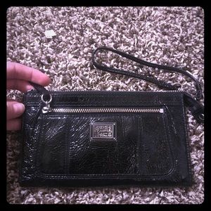 Coach Poppy wristlet.
